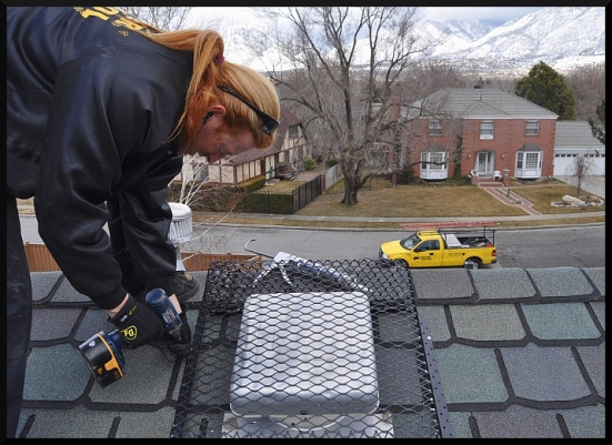 Installing roof vent guard in Cape Cod